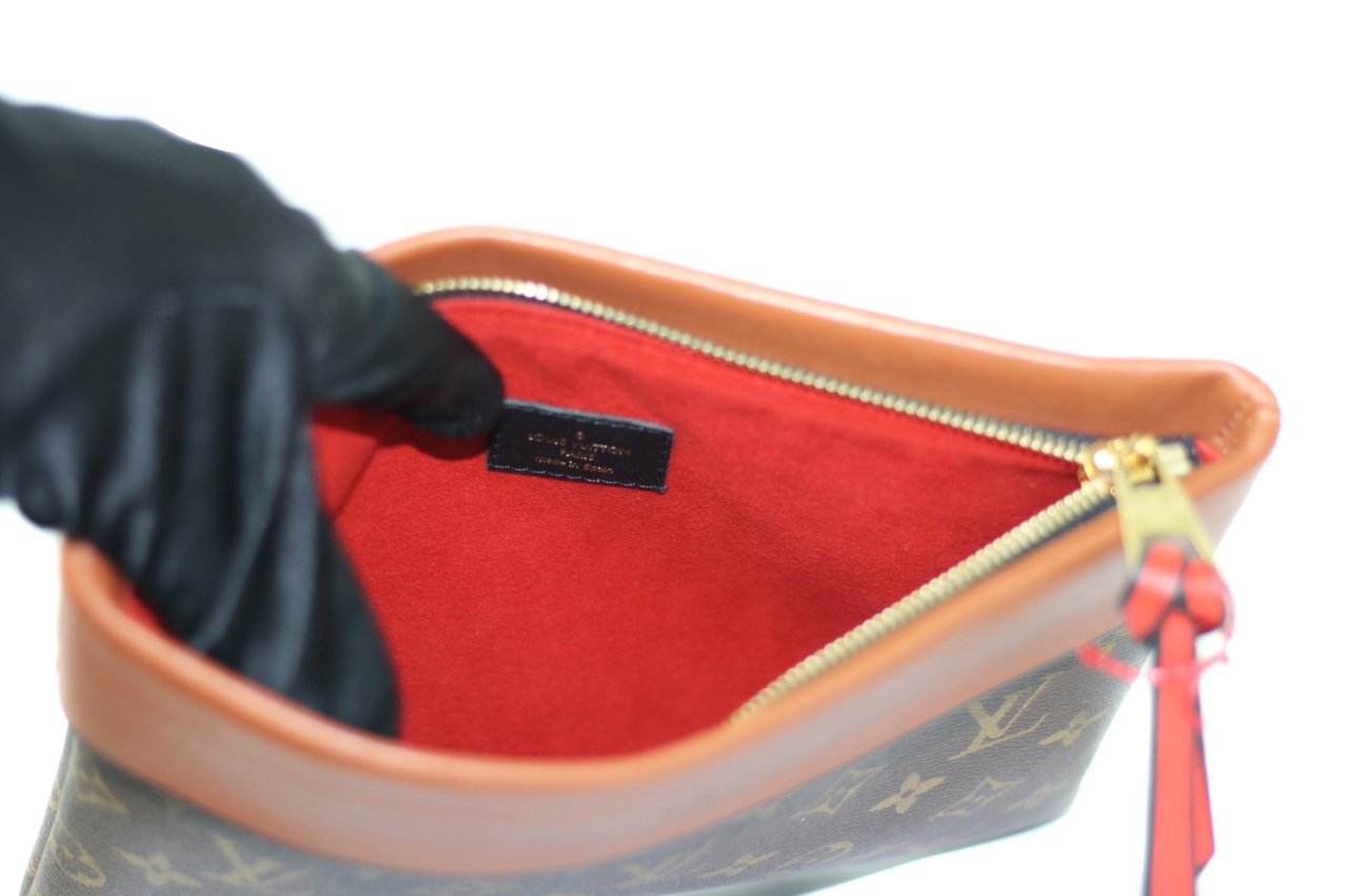 LOUIS VUITTON Tuileries Monogram Canvas Clutch Bag Caramel