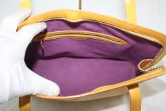 LOUIS VUITTON Yellow Epi Leather Lussac